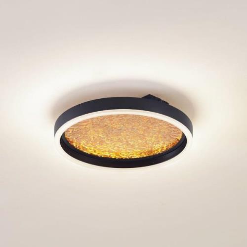 Lucande LED-taklampa Menulis, svart/guld, PC, Ø 30 cm